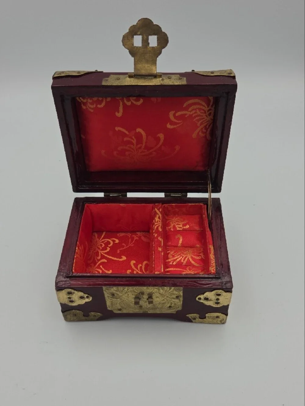 Ornate Red Decorative Jewelry Box with Brass Accents